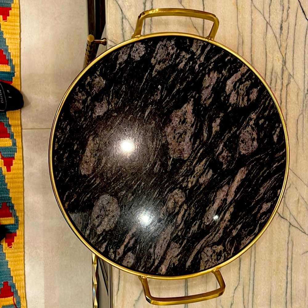 Used gold and marble cutting board.